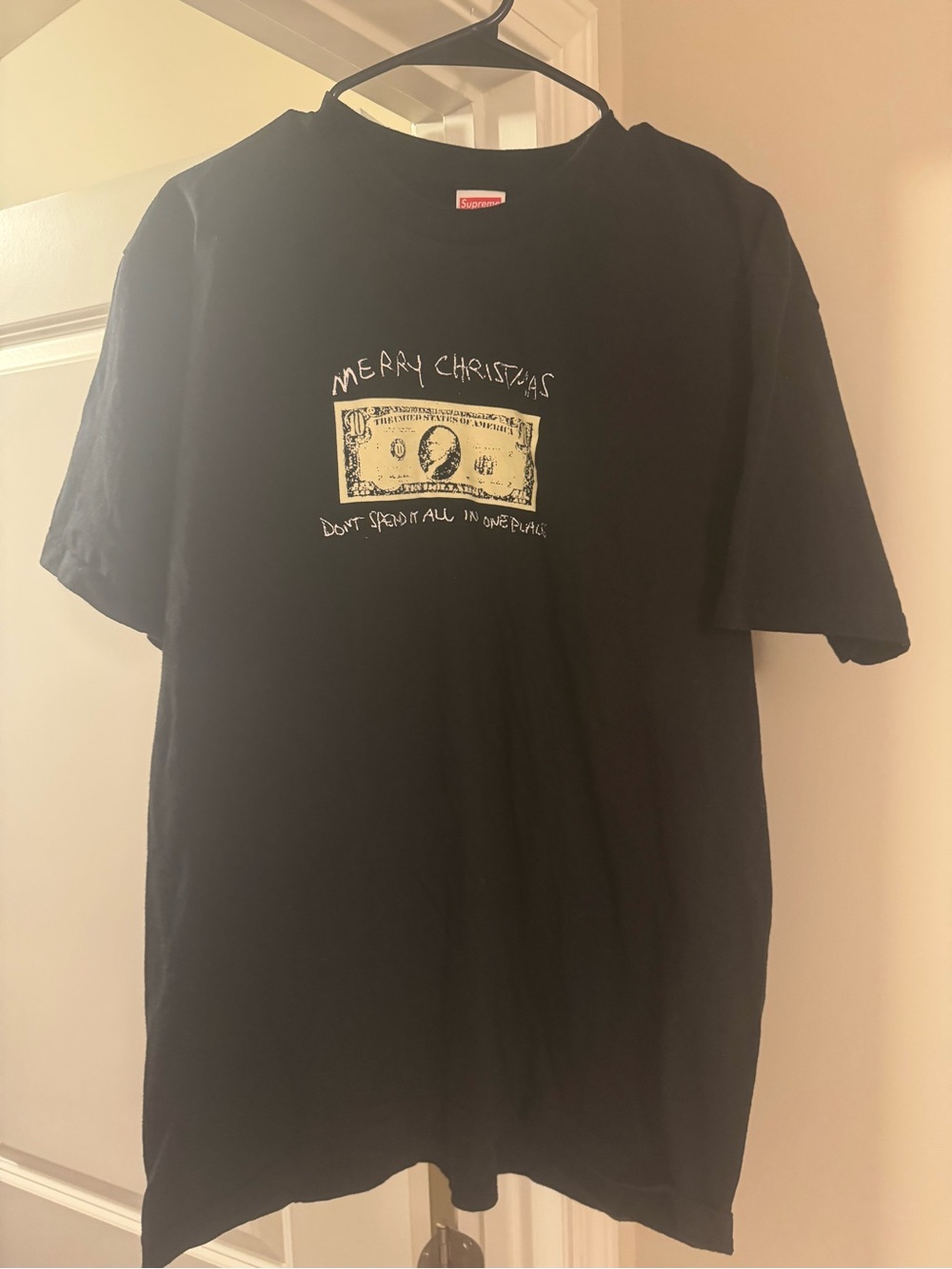 Supreme Black Tee with 'Merry Christmas' Money Graphic